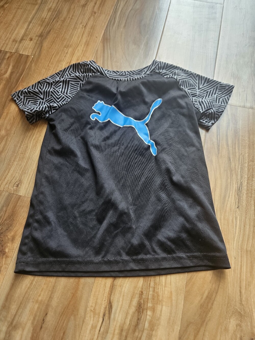 Puma Black Short Sleeve Tee with Blue Logo and Patterned Sleeves 4t